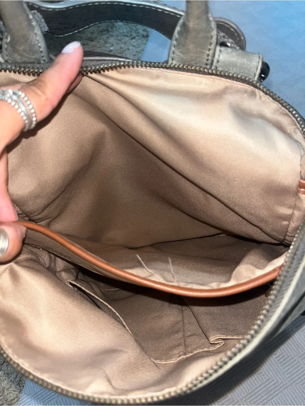 The Sak Metallic Gray Embossed Leather Backpack